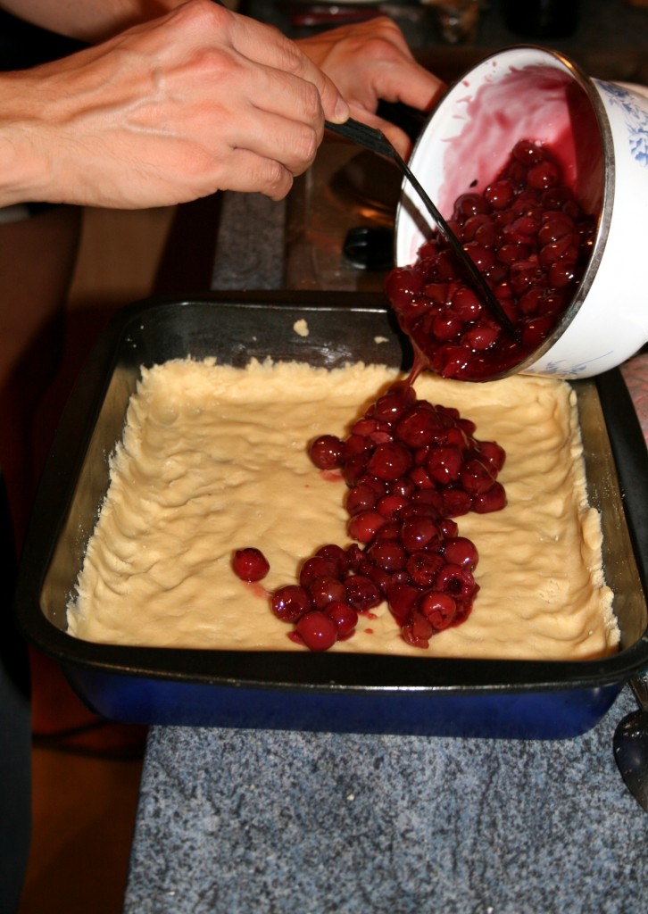 Spreading the cherries and the juice