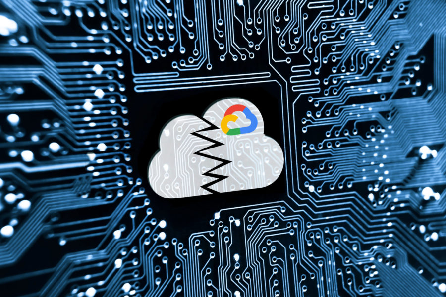 A cracked Google Cloud icon set against circuit board imagery